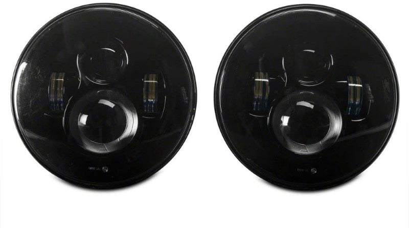 Raxiom 97–18 Jeep Wrangler TJ/JK Axial Series LED Daymaker-Scheinwerfer – schwarzes Gehäuse (klare Linse)