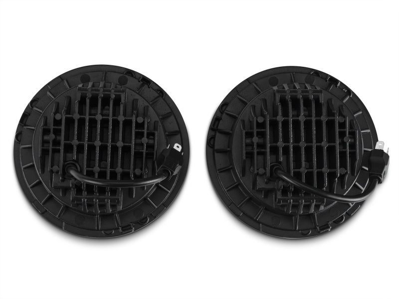 Raxiom 97–18 Jeep Wrangler TJ/JK Axial Series LED Daymaker-Scheinwerfer – schwarzes Gehäuse (klare Linse)